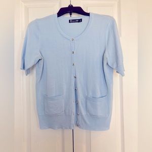 New York & Co. short sleeved baby blue button down sweater, size medium.